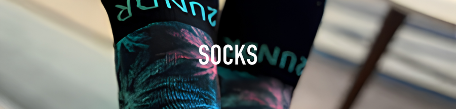 2UNDR Sport Ankle Socks in white and Flex Printed Crew Sock in Palmsy print displayed against light background.